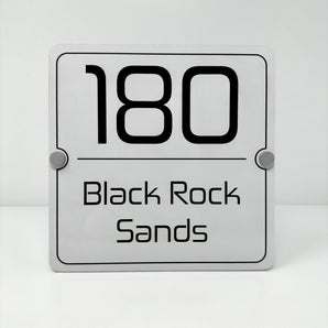 The Black Rock Sands Modern House Sign with a White Panel and Satin Silver Stand Off Fixings ( Size - 20cm x 20cm )