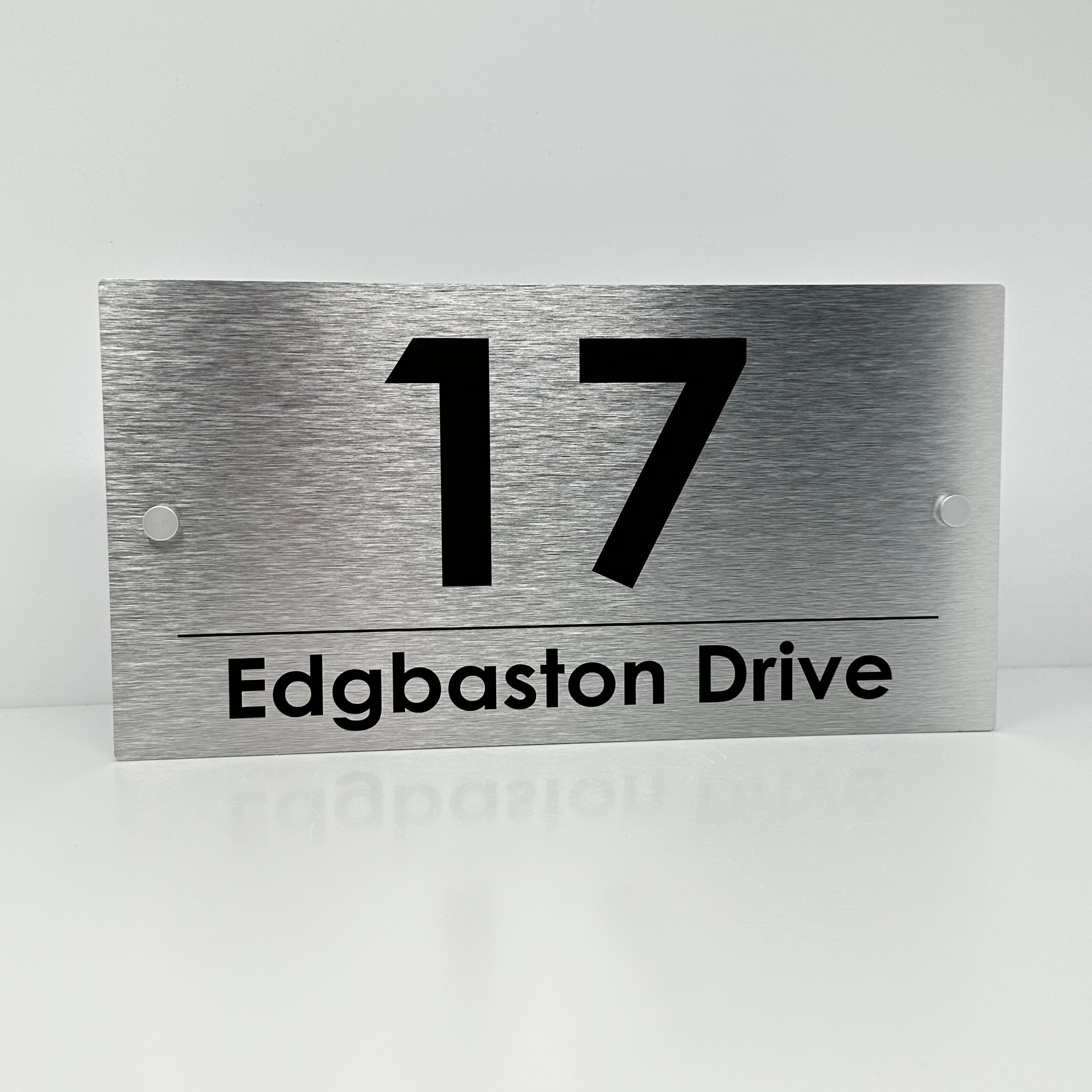 The Edgbaston Modern House Sign with a Brushed Silver Panel and Satin Silver Stand Off Fixings ( Size - 35cm x 18cm )