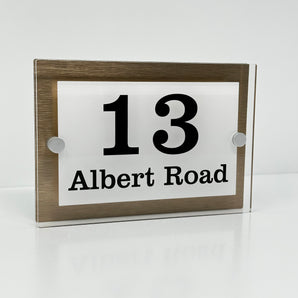 The Albert Modern House Sign with Perspex Acrylic Front, Brass Rear Panel and Satin Silver Stand Off Fixings ( Size - 20cm x 14cm - WHITE BACKGROUND BLACK TEXT )