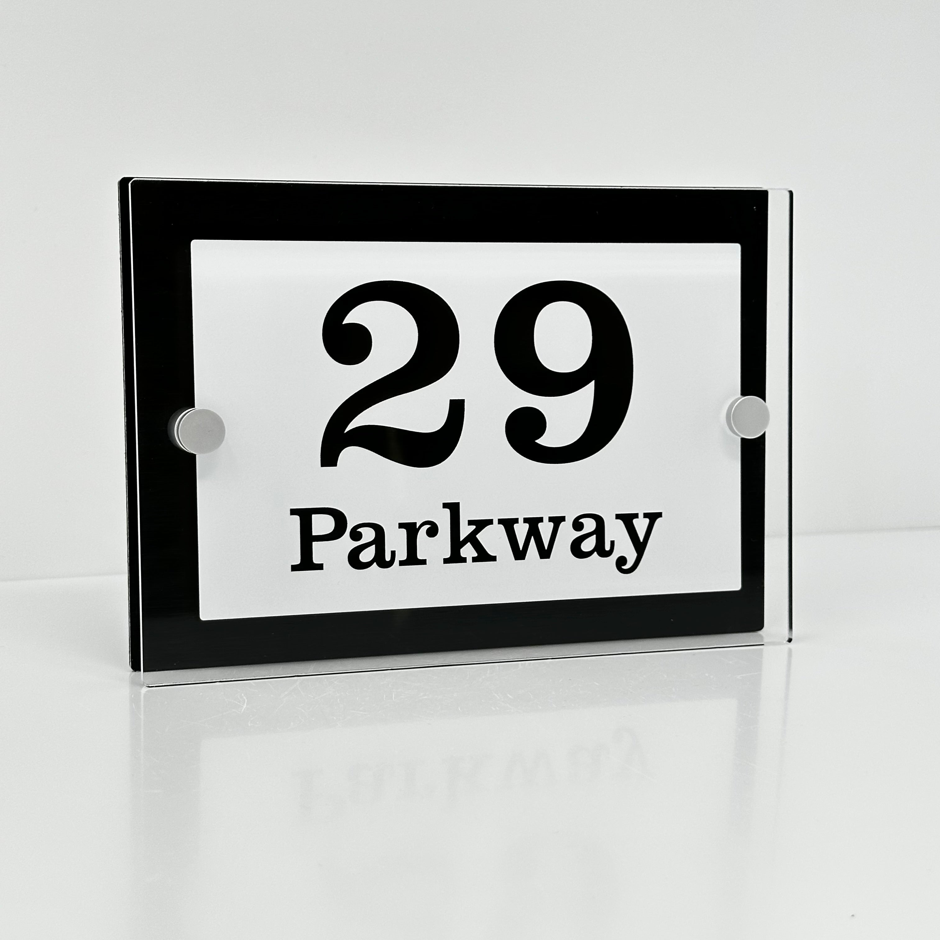 The Parkway Modern House Sign with Perspex Acrylic Front, Black Rear Panel and Satin Silver Stand Off Fixings ( Size - 20cm x 14cm - WHITE BACKGROUND CLEAR TEXT )