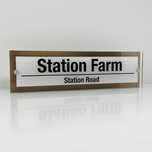 The Station Farm Modern House Sign with Perspex Acrylic Front, Brass Rear Panel and Satin Silver Stand Off Fixings ( Size - 42cm x 12cm - WHITE BACKGROUND BLACK TEXT )