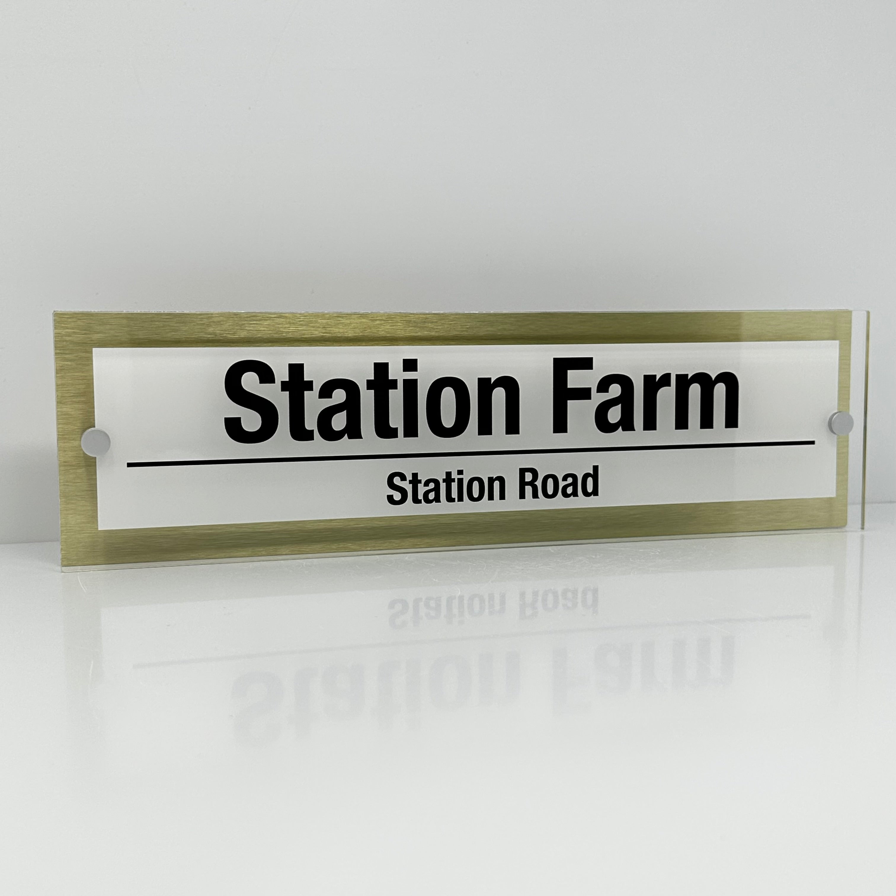 The Station Farm Modern House Sign with Perspex Acrylic Front, Gold Rear Panel and Satin Silver Stand Off Fixings ( Size - 42cm x 12cm - WHITE BACKGROUND BLACK TEXT )