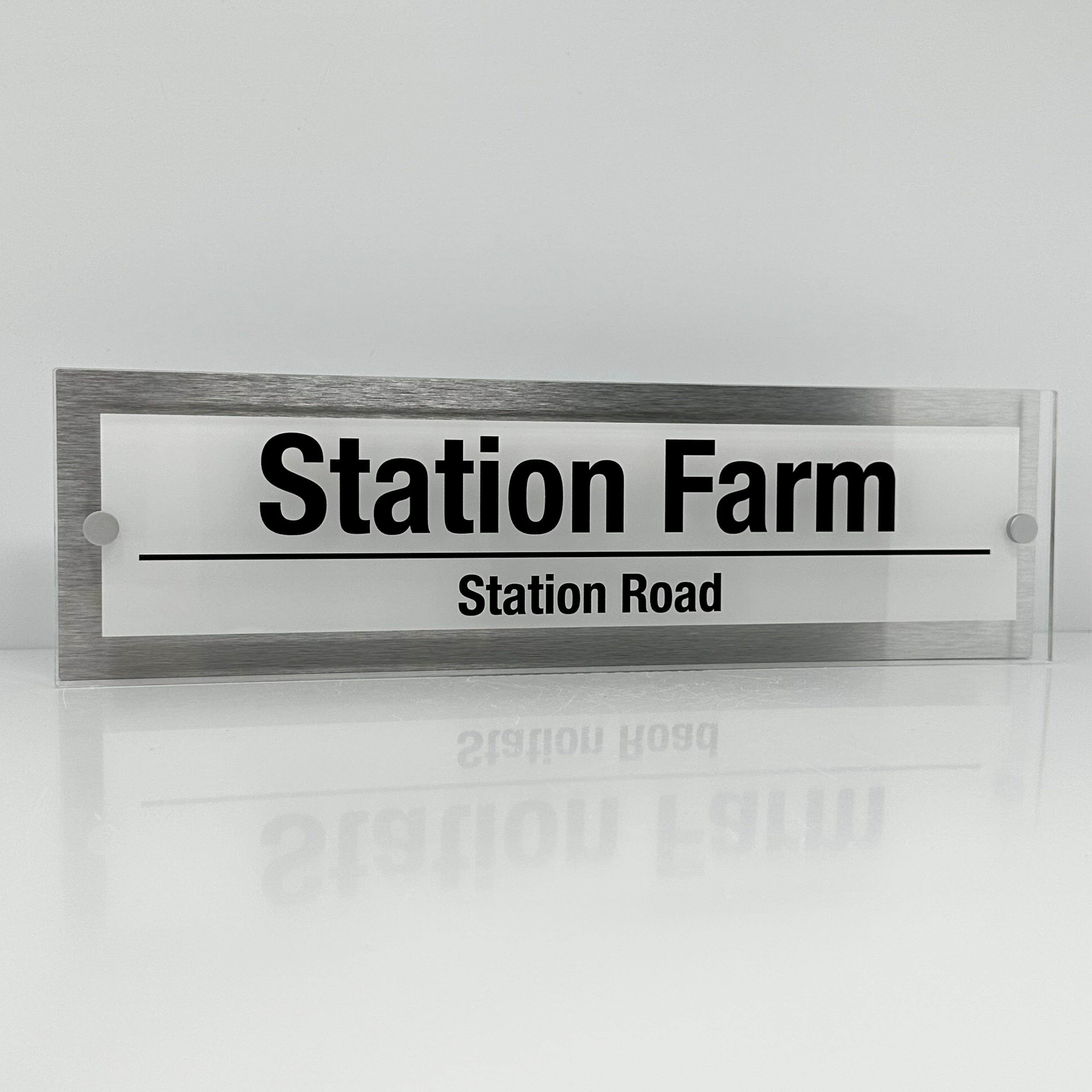 The Station Farm Modern House Sign with Perspex Acrylic Front, Silver Rear Panel and Satin Silver Stand Off Fixings ( Size - 42cm x 12cm - WHITE BACKGROUND BLACK TEXT )