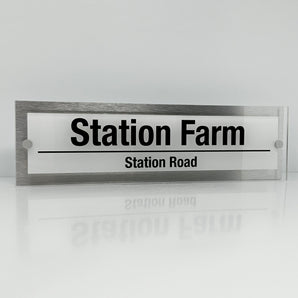 The Station Farm Modern House Sign with Perspex Acrylic Front, Silver Rear Panel and Satin Silver Stand Off Fixings ( Size - 42cm x 12cm - WHITE BACKGROUND BLACK TEXT )