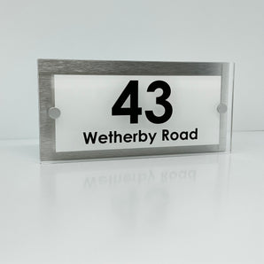 The Wetherby Modern House Sign with Perspex Acrylic Front, Silver Rear Panel and Satin Silver Stand Off Fixings ( Size - 25cm x 12cm - WHITE BACKGROUND BLACK TEXT )