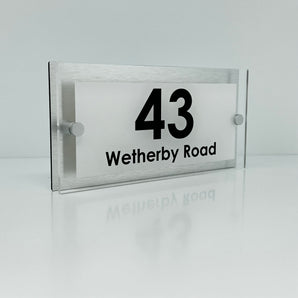 The Wetherby Modern House Sign with Perspex Acrylic Front, Silver Rear Panel and Satin Silver Stand Off Fixings ( Size - 25cm x 12cm - WHITE BACKGROUND BLACK TEXT )