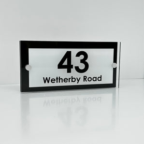 The Wetherby Modern House Sign with Perspex Acrylic Front, Black Rear Panel and Satin Silver Stand Off Fixings ( Size - 25cm x 12cm - WHITE BACKGROUND BLACK TEXT )