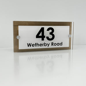 The Wetherby Modern House Sign with Perspex Acrylic Front, Brass Rear Panel and Satin Silver Stand Off Fixings ( Size - 25cm x 12cm - WHITE BACKGROUND BLACK TEXT )