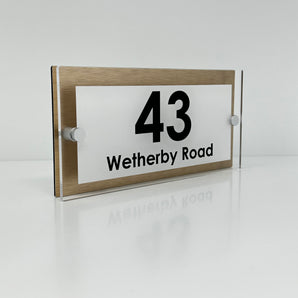 The Wetherby Modern House Sign with Perspex Acrylic Front, Brass Rear Panel and Satin Silver Stand Off Fixings ( Size - 25cm x 12cm - WHITE BACKGROUND BLACK TEXT )