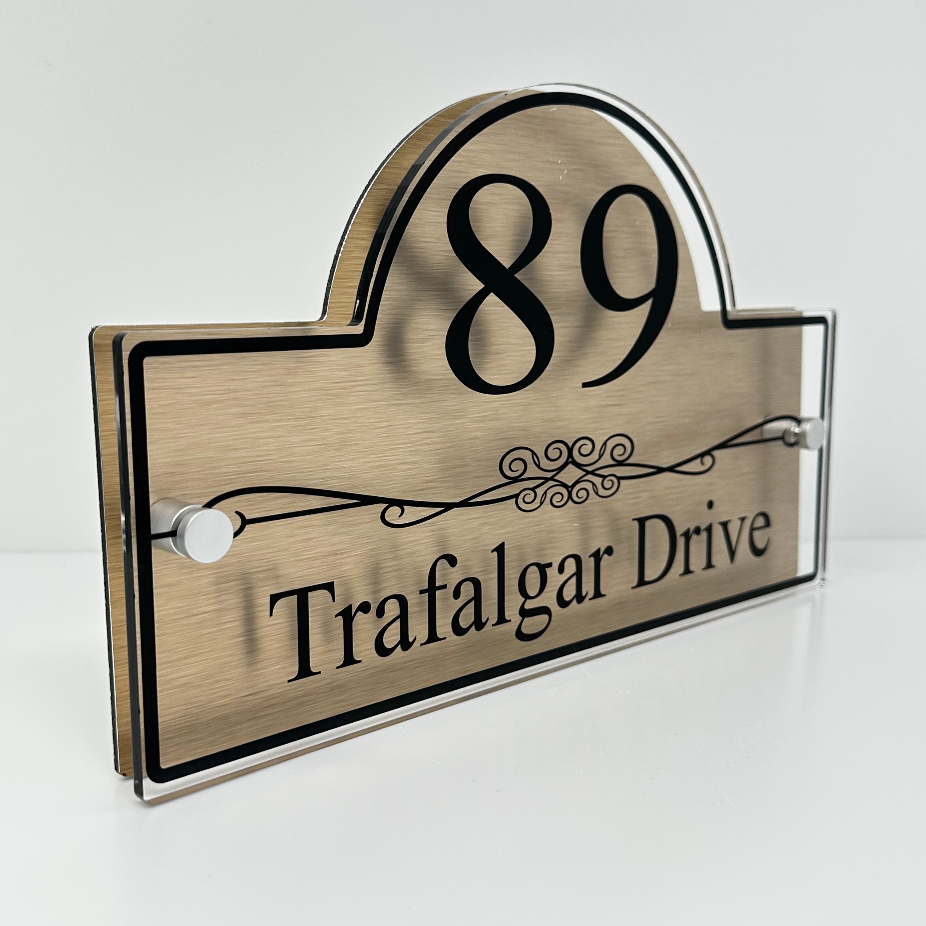 The Trafalgar Modern House Sign with Perspex Acrylic Front, Brass Rear Panel and Satin Silver Stand Off Fixings ( Size - 30cm x 18cm )
