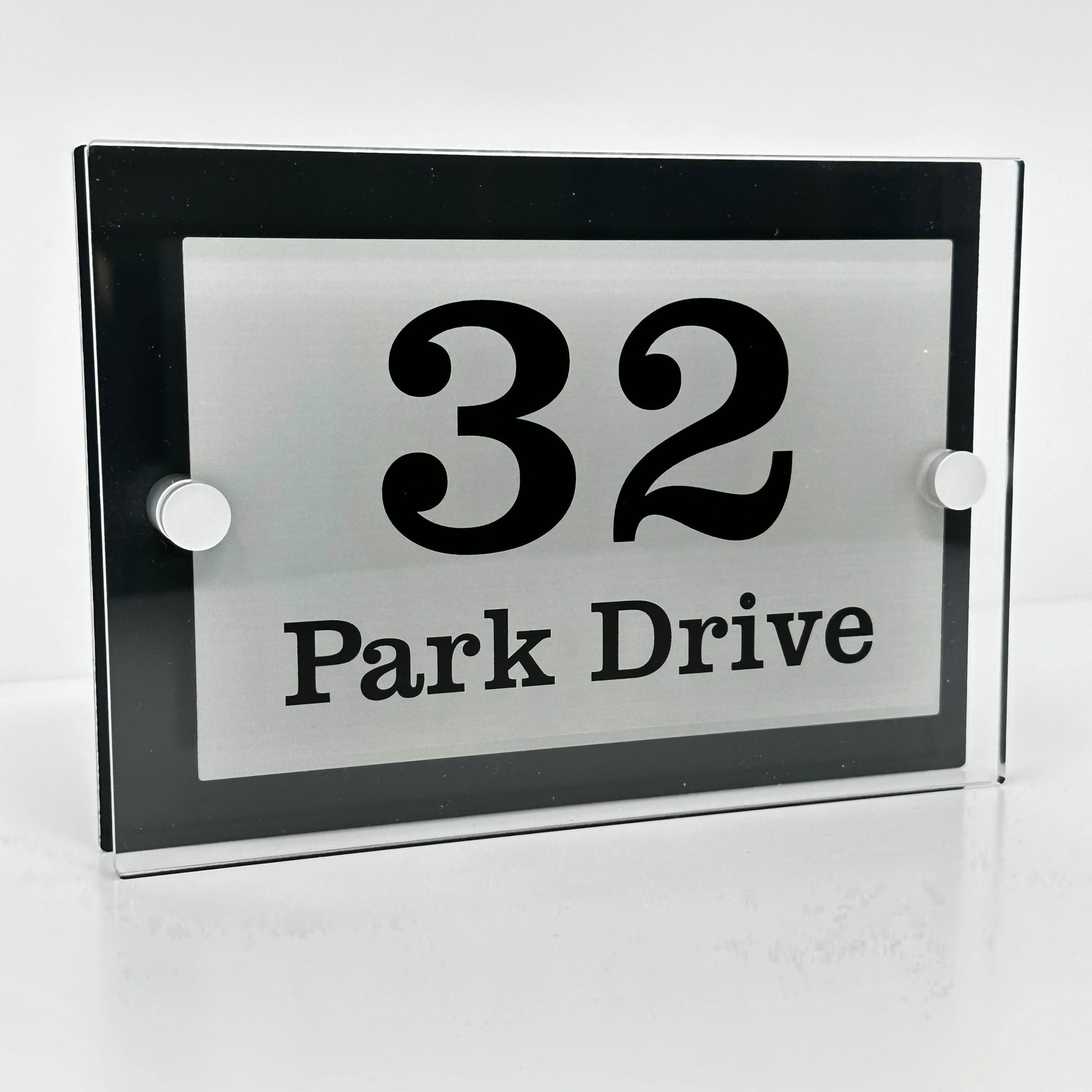 The Park Drive Modern House Sign with Perspex Acrylic Front, Black Rear Panel and Satin Silver Stand Off Fixings ( Size - 20cm x 14cm )