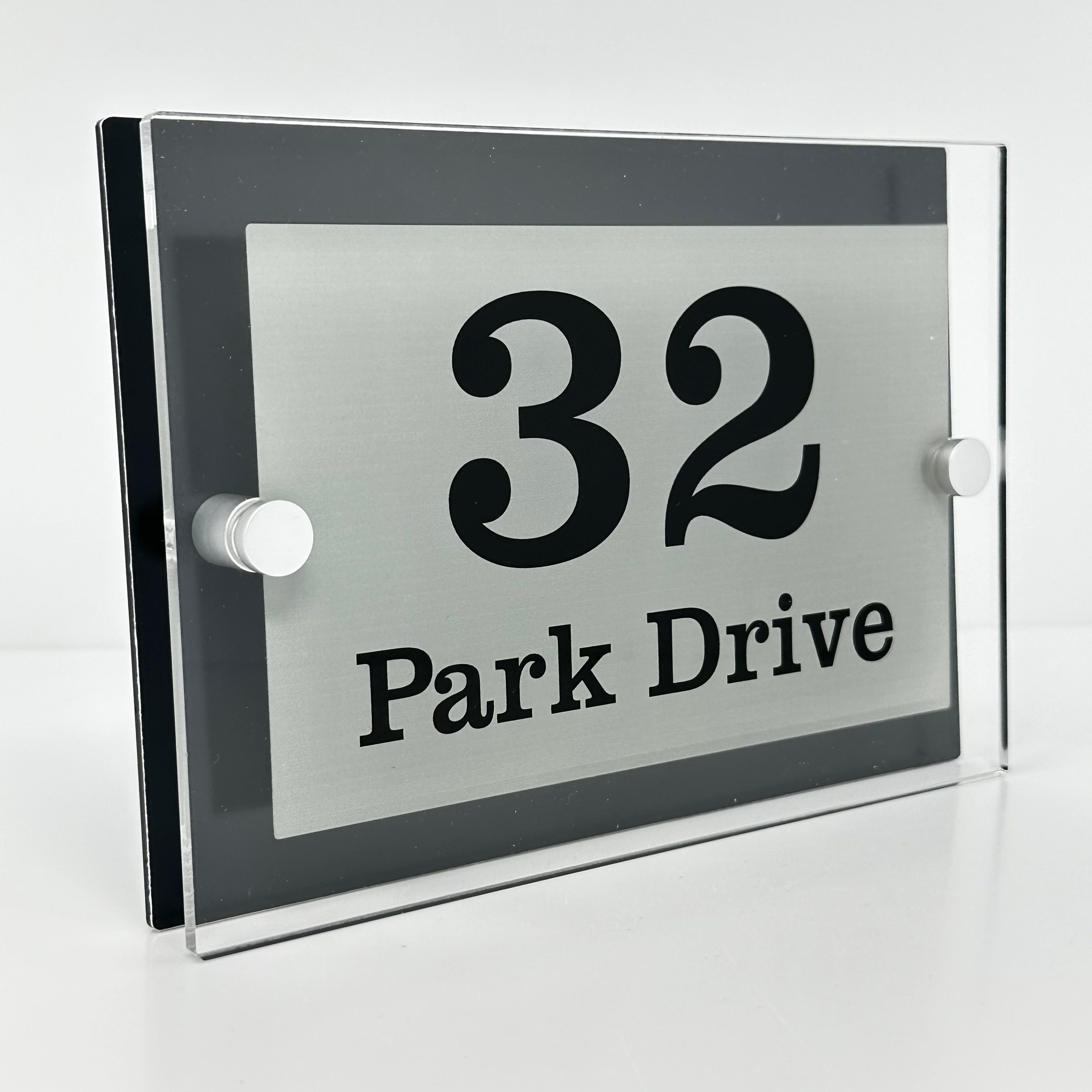 The Park Drive Modern House Sign with Perspex Acrylic Front, Black Rear Panel and Satin Silver Stand Off Fixings ( Size - 20cm x 14cm )