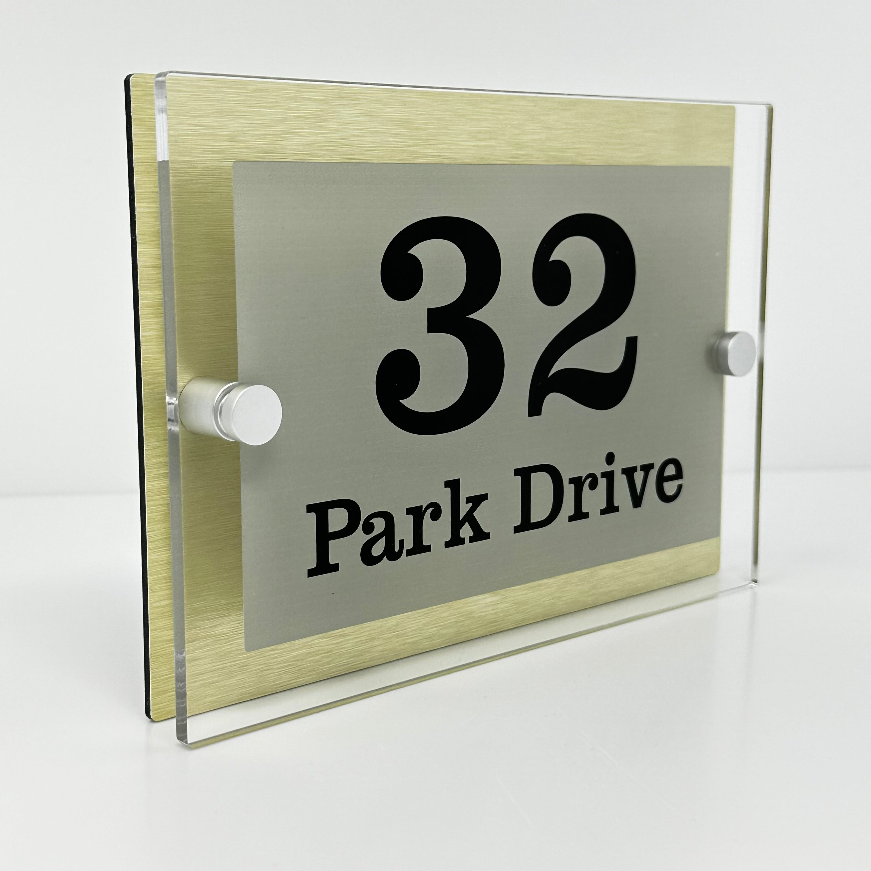 The Park Drive Modern House Sign with Perspex Acrylic Front, Gold Rear Panel and Satin Silver Stand Off Fixings ( Size - 20cm x 14cm )
