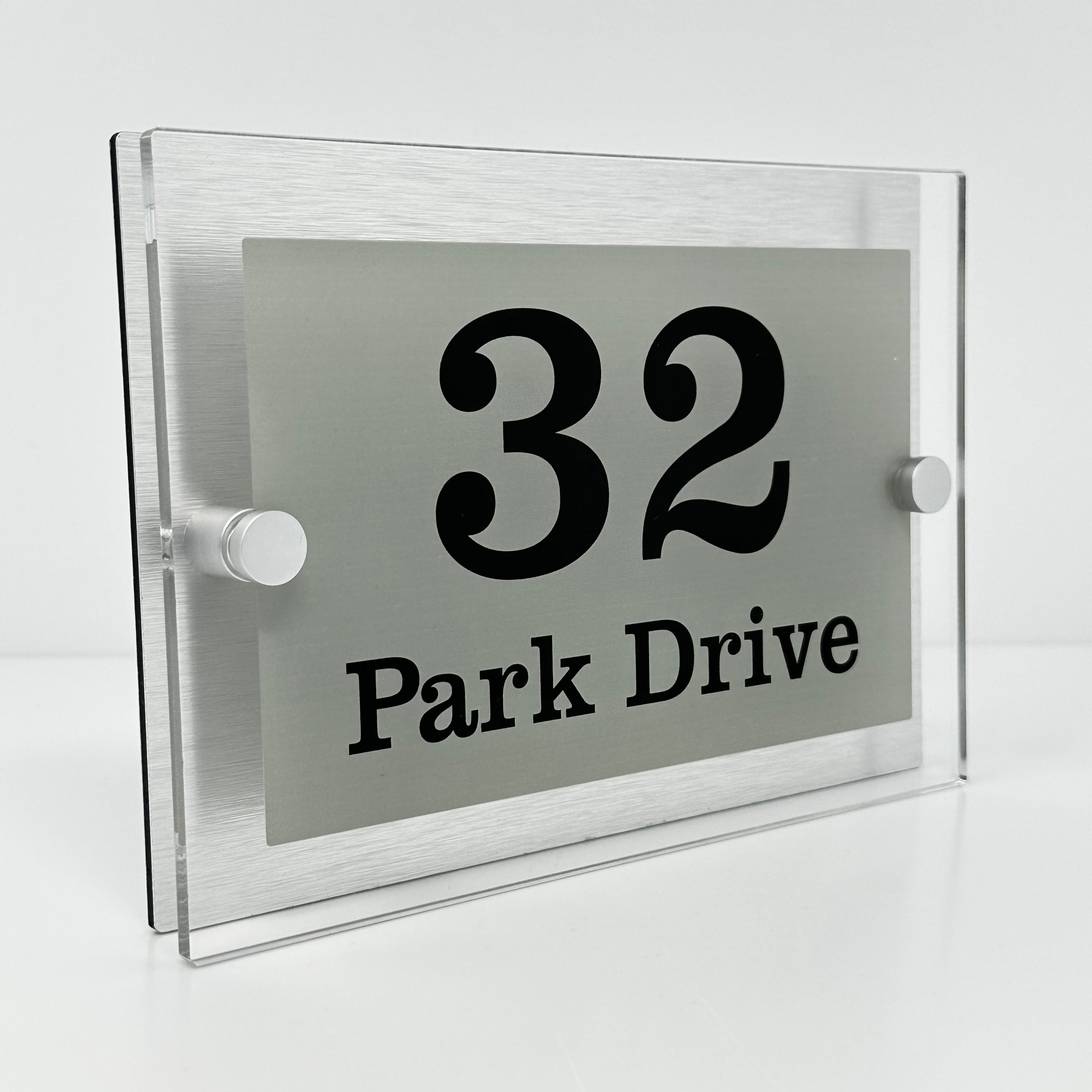 The Park Drive Modern House Sign with Perspex Acrylic Front, Silver Rear Panel and Satin Silver Stand Off Fixings ( Size - 20cm x 14cm )
