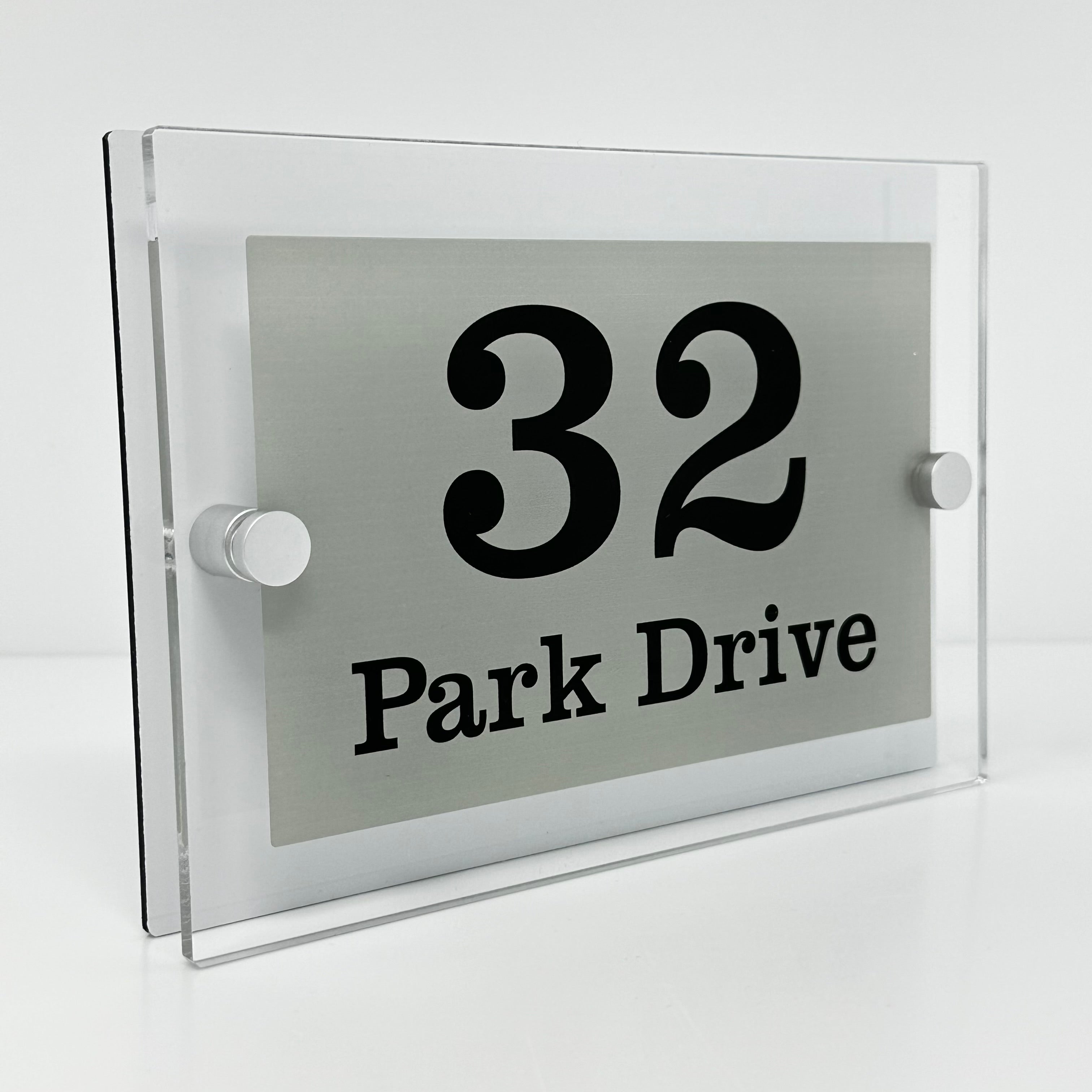 The Park Drive Modern House Sign with Perspex Acrylic Front, White Rear Panel and Satin Silver Stand Off Fixings ( Size - 20cm x 14cm )