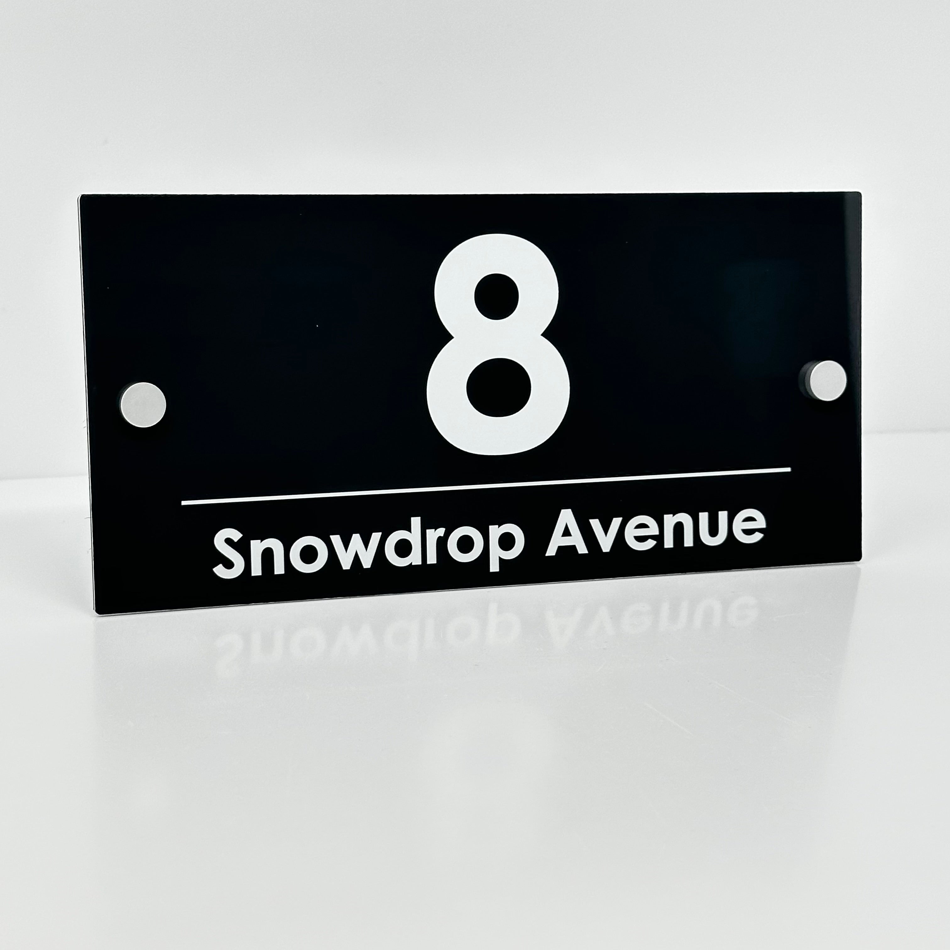 The Snowdrop Modern House Sign with a Anthracite Grey Panel and Satin Silver Stand Off Fixings ( Size - 25cm x 12cm )