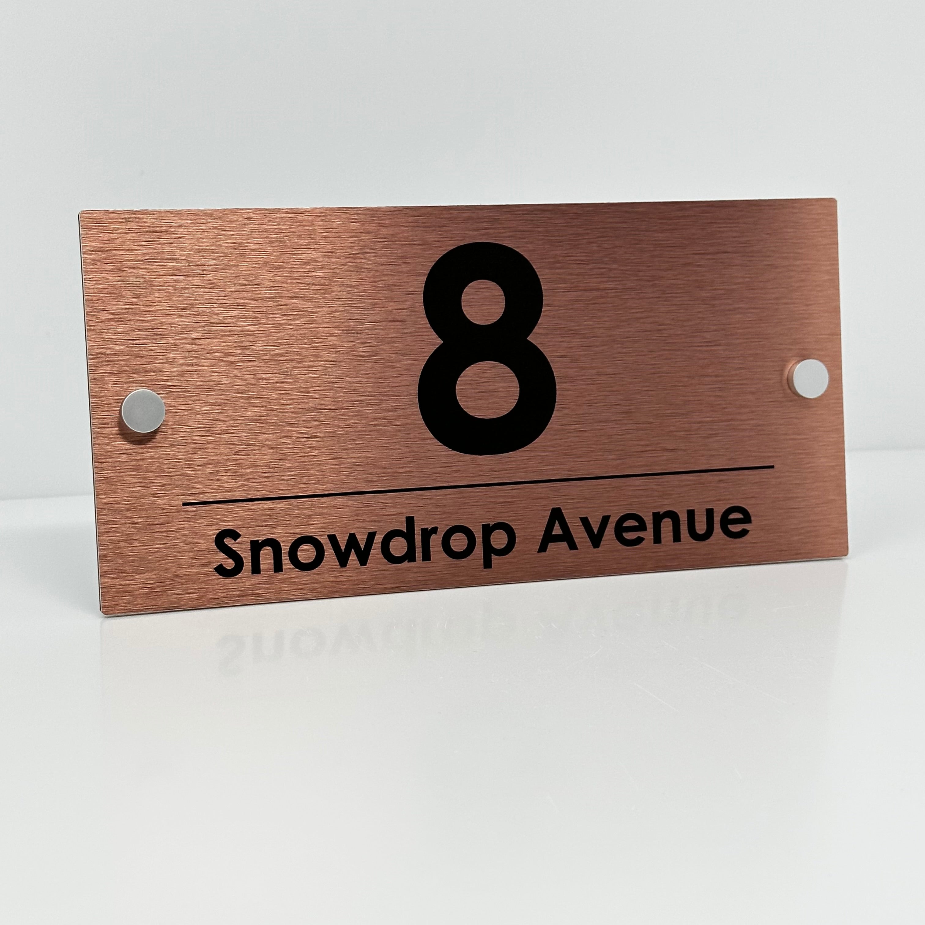 The Snowdrop Modern House Sign with a Brushed Copper Panel and Satin Silver Stand Off Fixings ( Size - 25cm x 12cm )