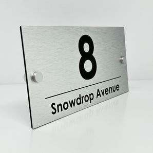 The Snowdrop Modern House Sign with a Brushed Silver Panel and Satin Silver Stand Off Fixings ( Size - 25cm x 12cm )